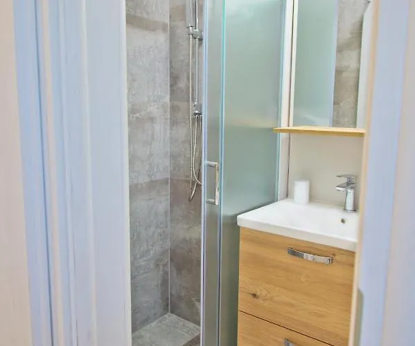 Karolina - Oasis Apartman Póla